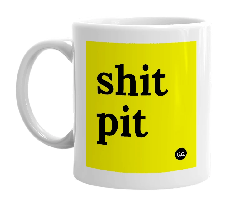 White mug with 'shit pit' in bold black letters
