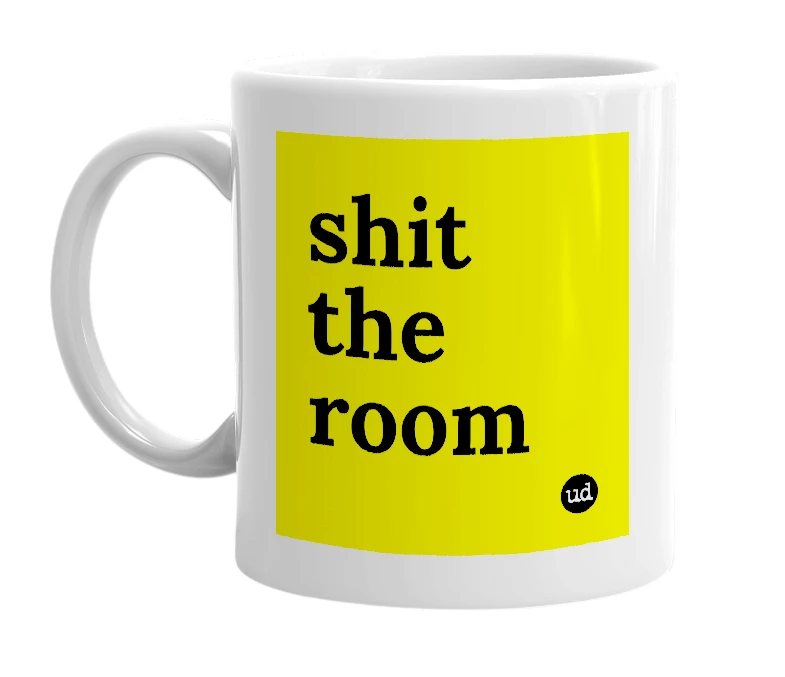 White mug with 'shit the room' in bold black letters