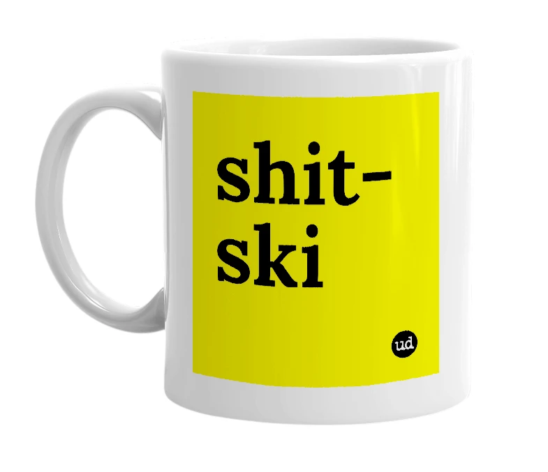 White mug with 'shit-ski' in bold black letters