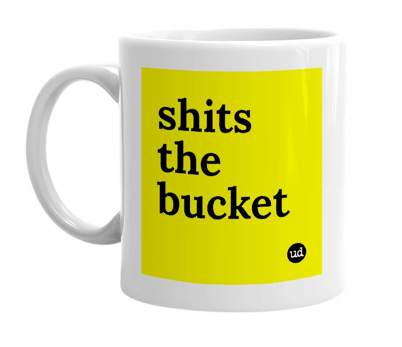 White mug with 'shits the bucket' in bold black letters