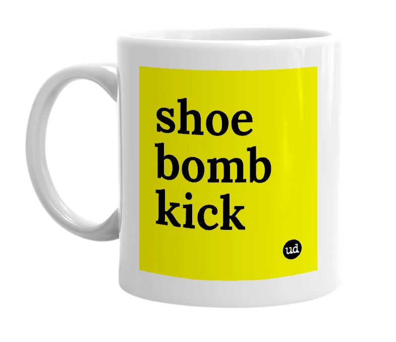 White mug with 'shoe bomb kick' in bold black letters