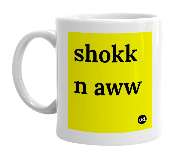 White mug with 'shokk n aww' in bold black letters