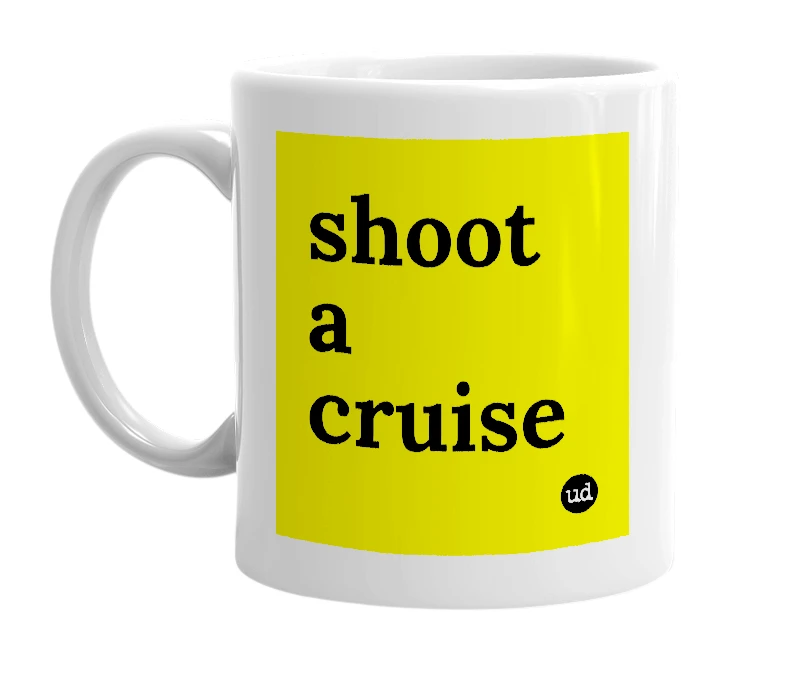 White mug with 'shoot a cruise' in bold black letters