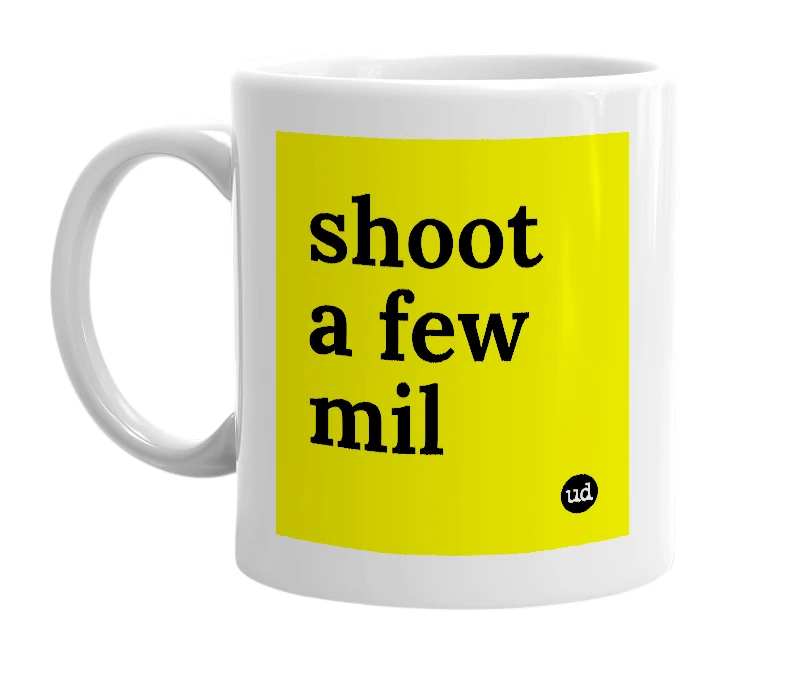 White mug with 'shoot a few mil' in bold black letters