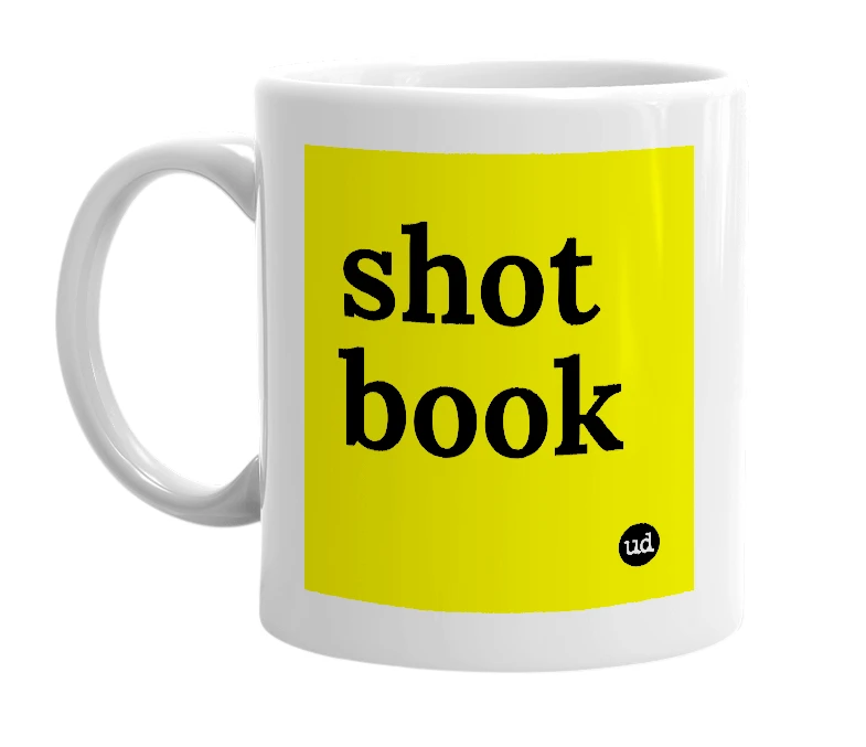 White mug with 'shot book' in bold black letters