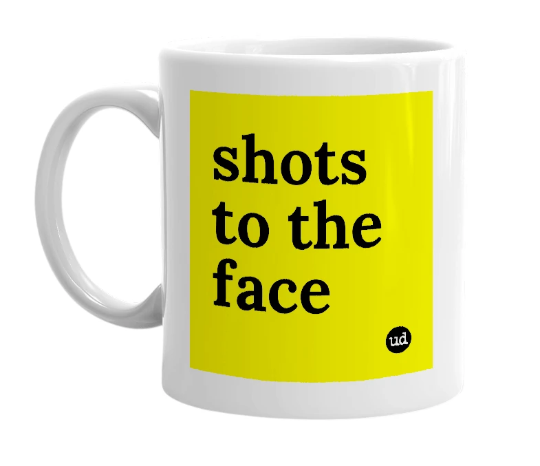 White mug with 'shots to the face' in bold black letters