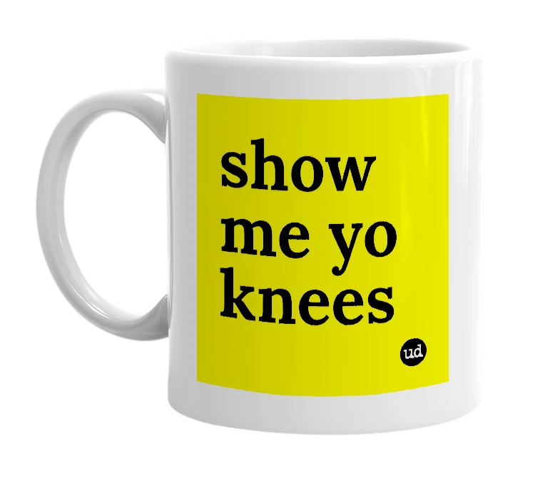 White mug with 'show me yo knees' in bold black letters