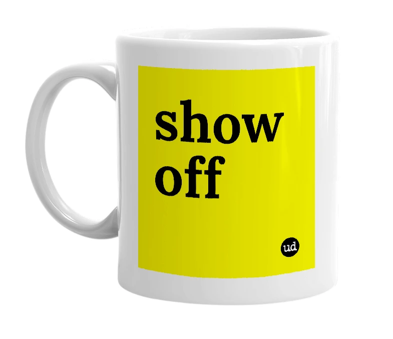 White mug with 'show off' in bold black letters