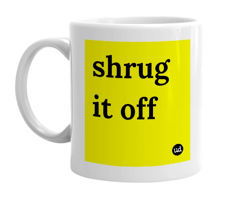 White mug with 'shrug it off' in bold black letters
