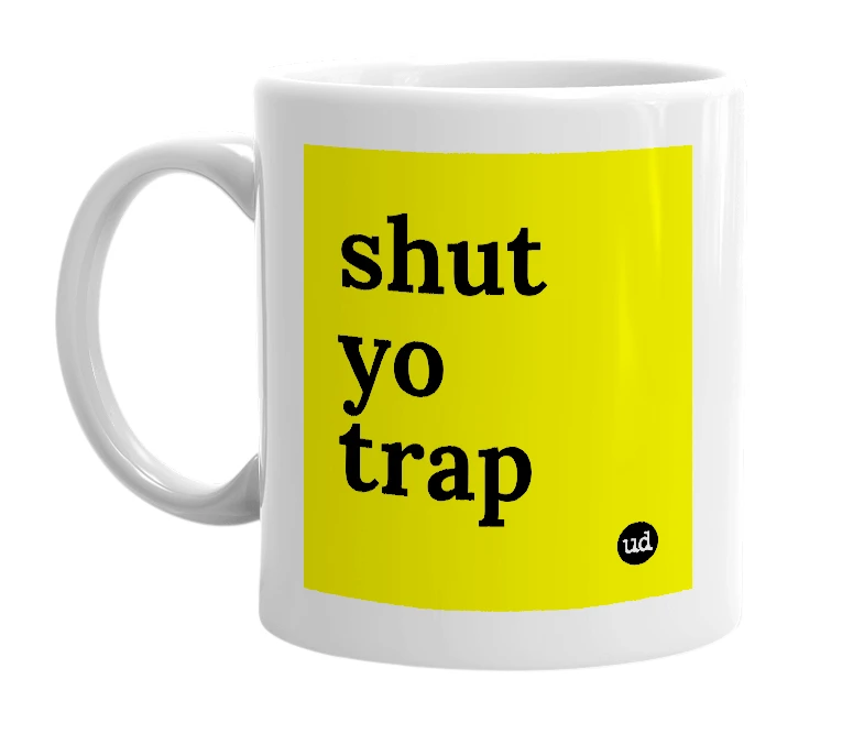 White mug with 'shut yo trap' in bold black letters