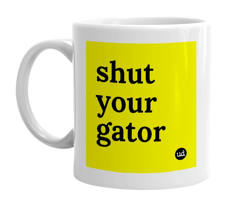 White mug with 'shut your gator' in bold black letters