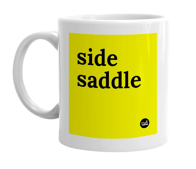 White mug with 'side saddle' in bold black letters