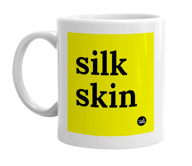 White mug with 'silk skin' in bold black letters