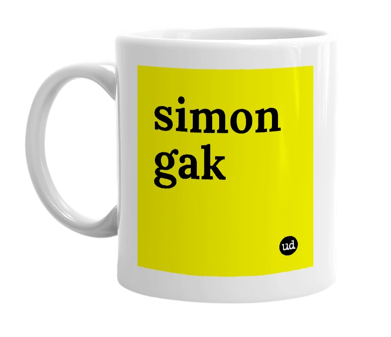 White mug with 'simon gak' in bold black letters