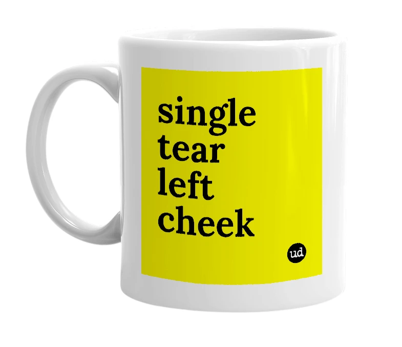 White mug with 'single tear left cheek' in bold black letters