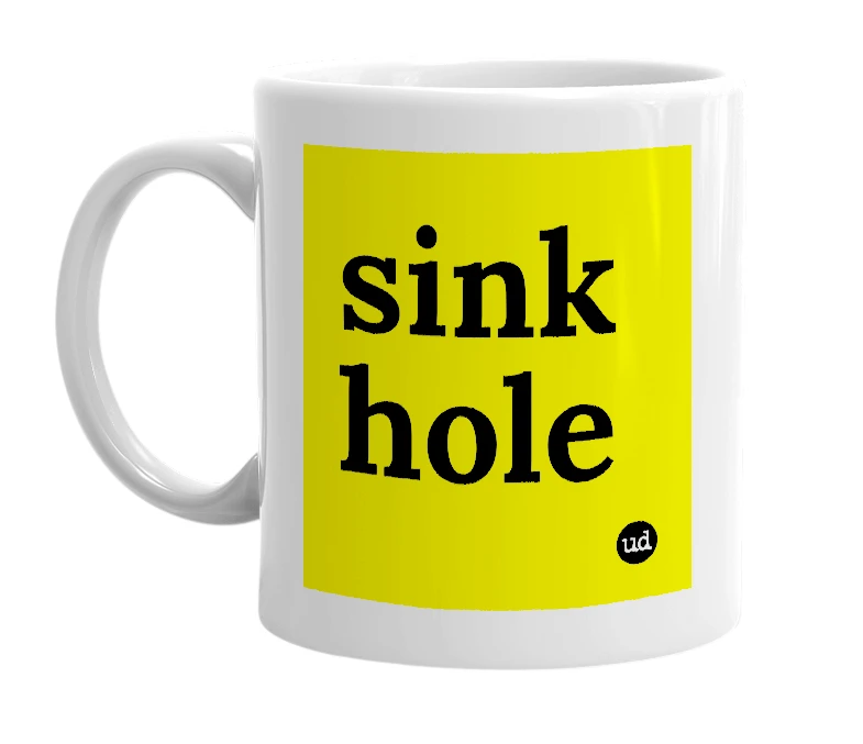 White mug with 'sink hole' in bold black letters