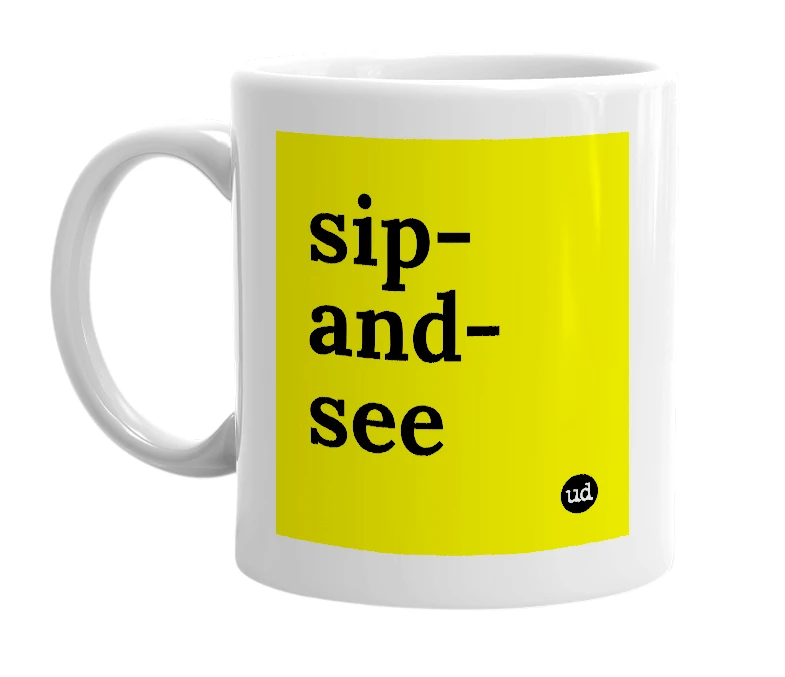 White mug with 'sip-and-see' in bold black letters