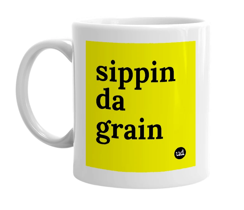 White mug with 'sippin da grain' in bold black letters