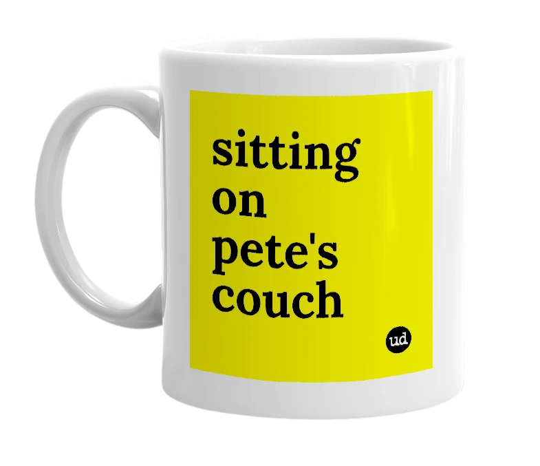 White mug with 'sitting on pete's couch' in bold black letters