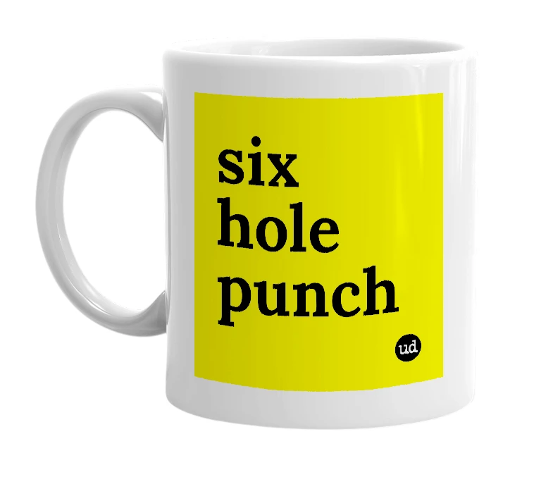 White mug with 'six hole punch' in bold black letters