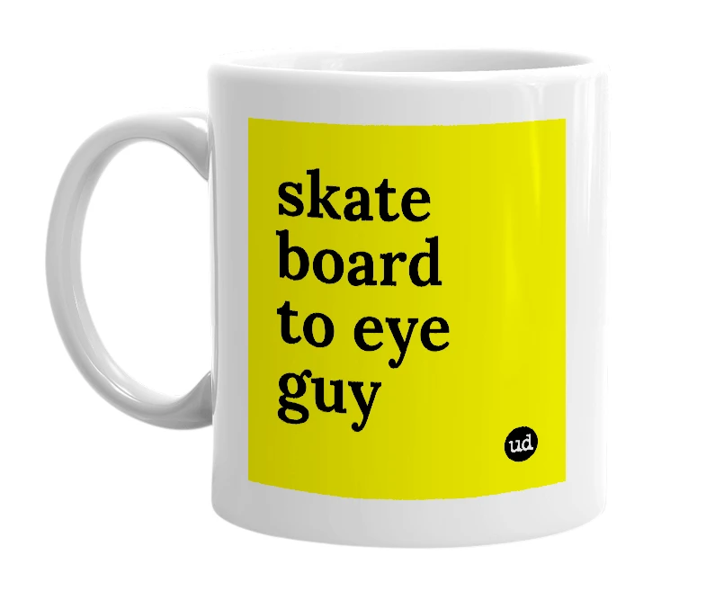 White mug with 'skate board to eye guy' in bold black letters