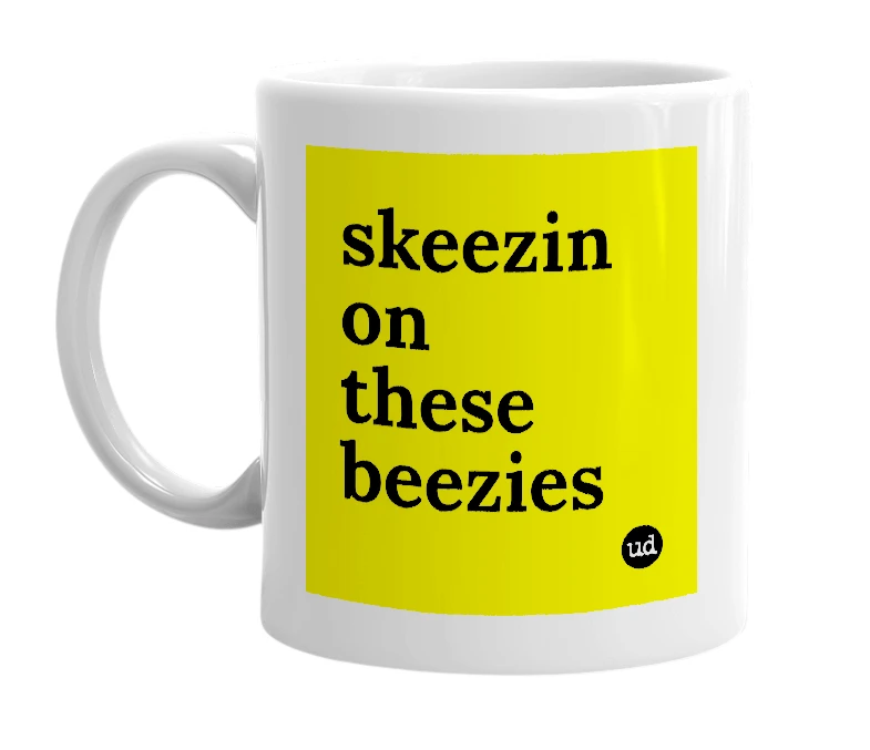 White mug with 'skeezin on these beezies' in bold black letters