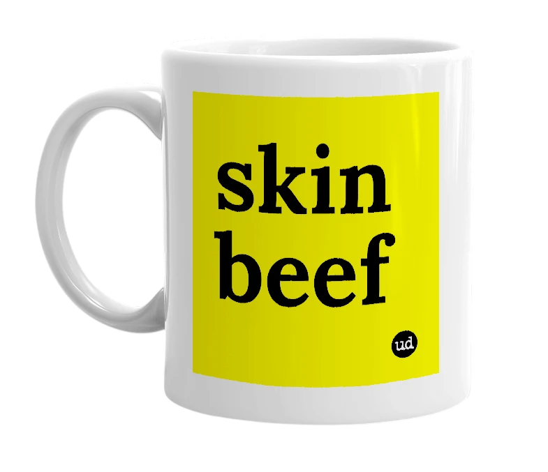 White mug with 'skin beef' in bold black letters