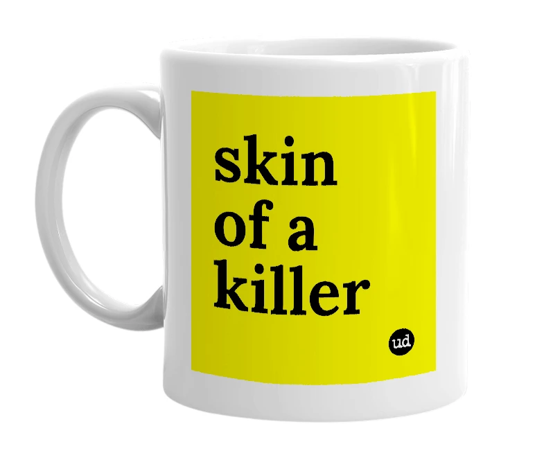 White mug with 'skin of a killer' in bold black letters