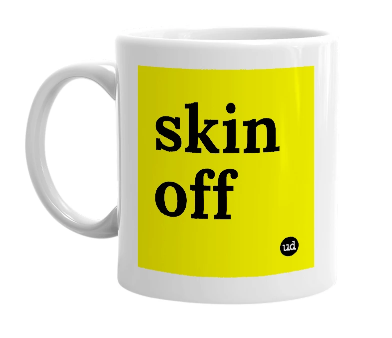 White mug with 'skin off' in bold black letters