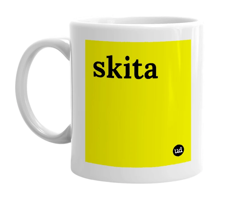 White mug with 'skita' in bold black letters
