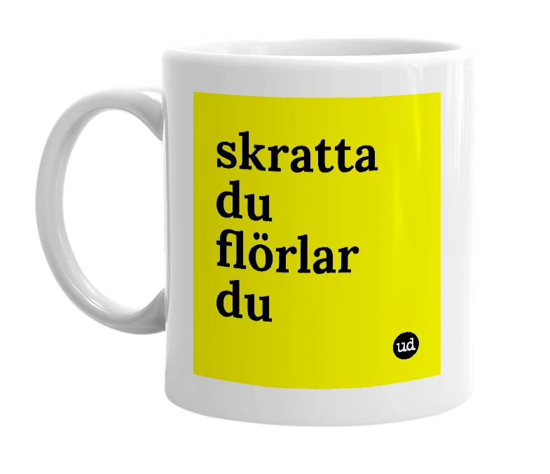 White mug with 'skratta du flörlar du' in bold black letters