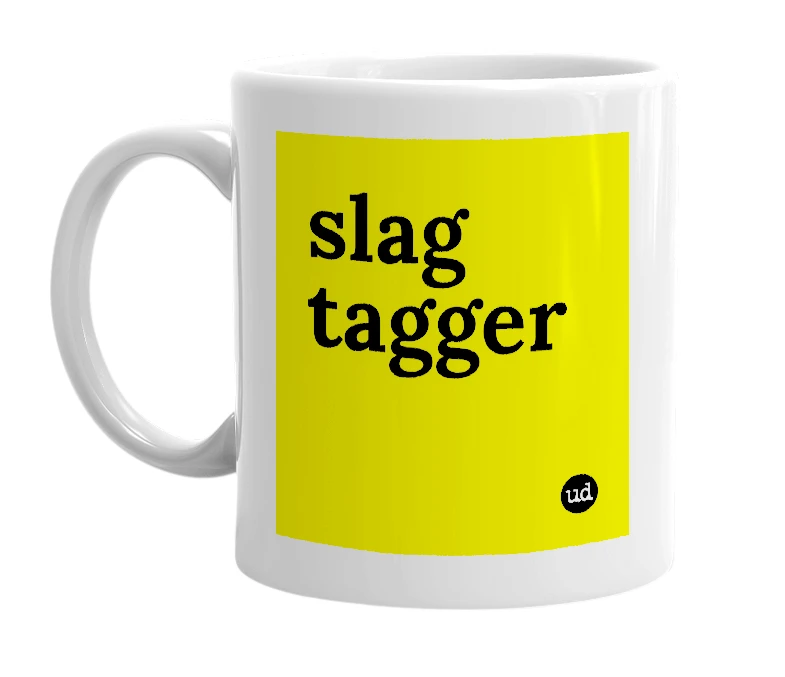 White mug with 'slag tagger' in bold black letters