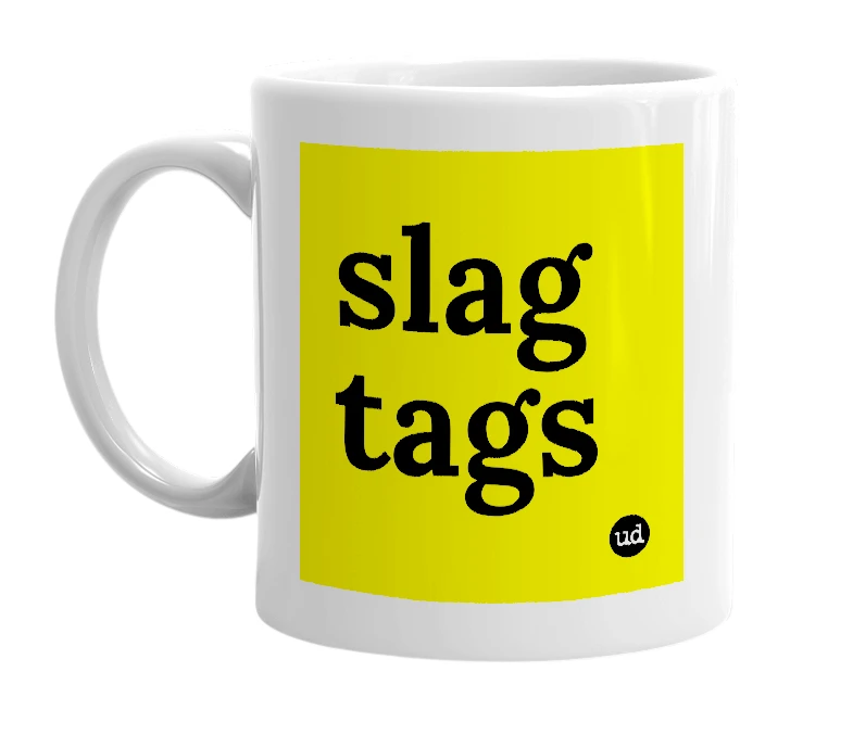 White mug with 'slag tags' in bold black letters