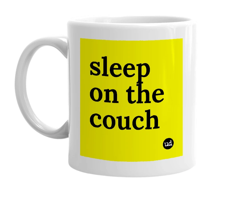 White mug with 'sleep on the couch' in bold black letters