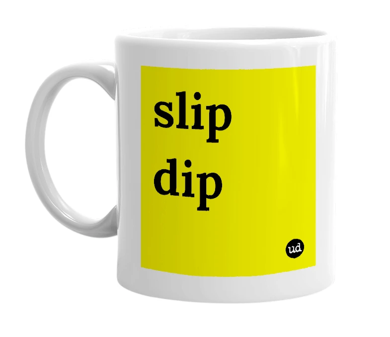 White mug with 'slip dip' in bold black letters