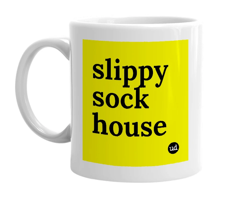 White mug with 'slippy sock house' in bold black letters