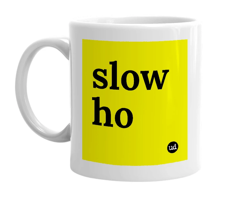 White mug with 'slow ho' in bold black letters