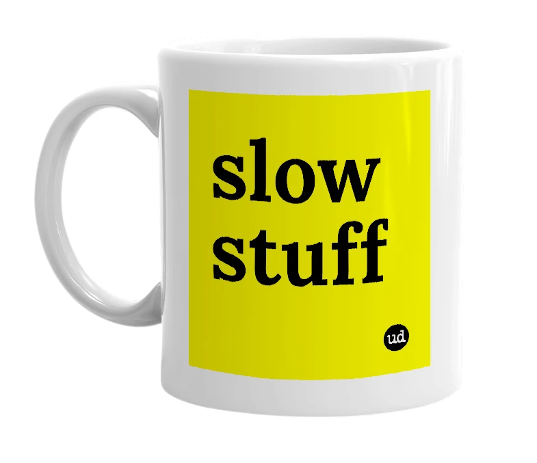 White mug with 'slow stuff' in bold black letters