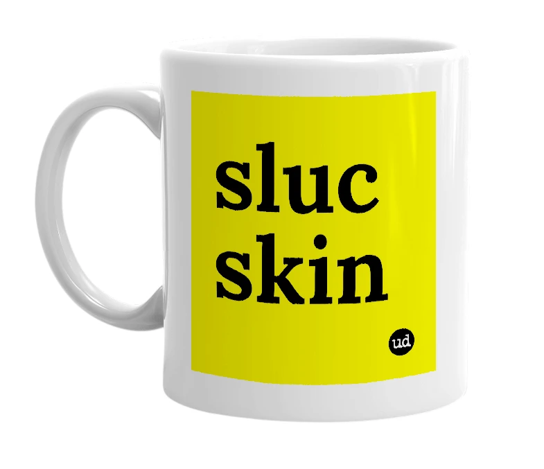 White mug with 'sluc skin' in bold black letters