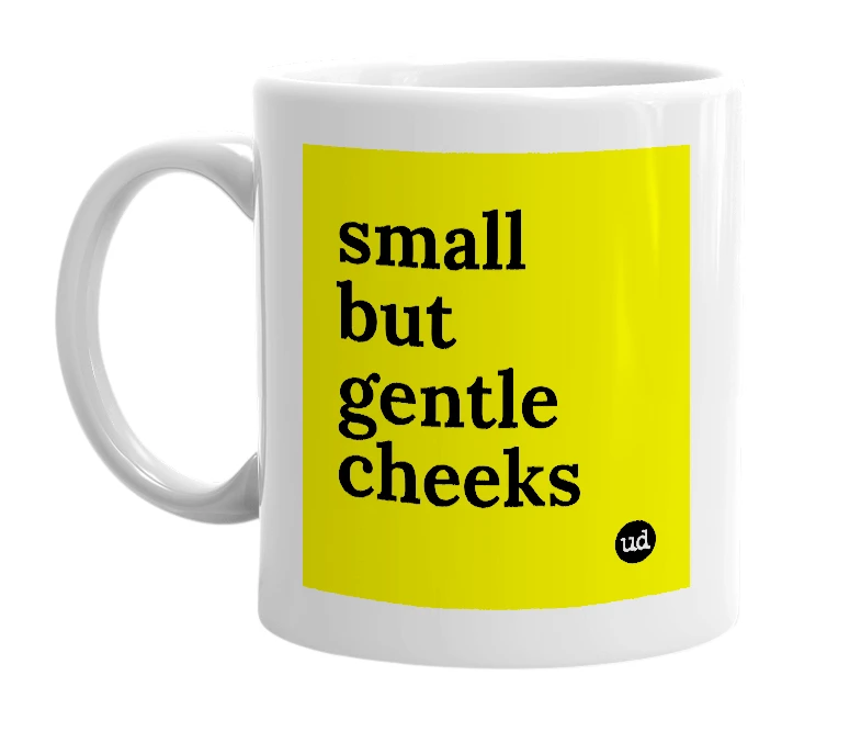 White mug with 'small but gentle cheeks' in bold black letters