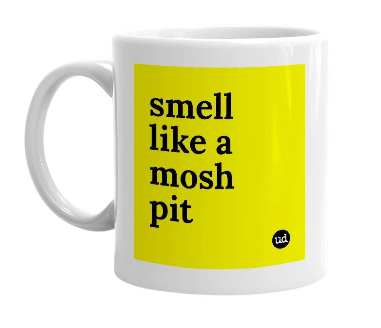 White mug with 'smell like a mosh pit' in bold black letters