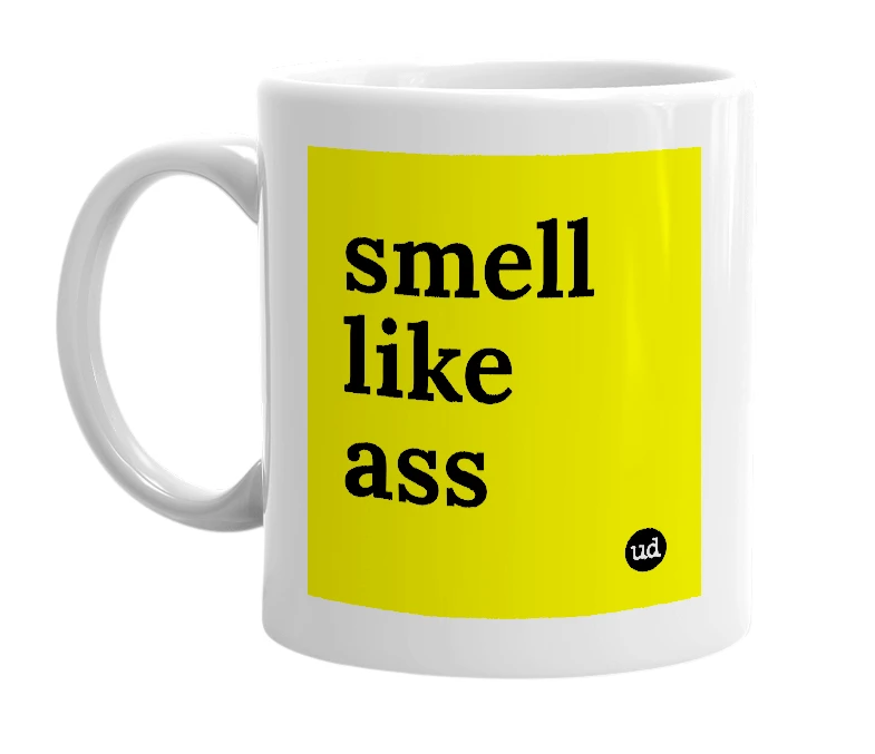 White mug with 'smell like ass' in bold black letters