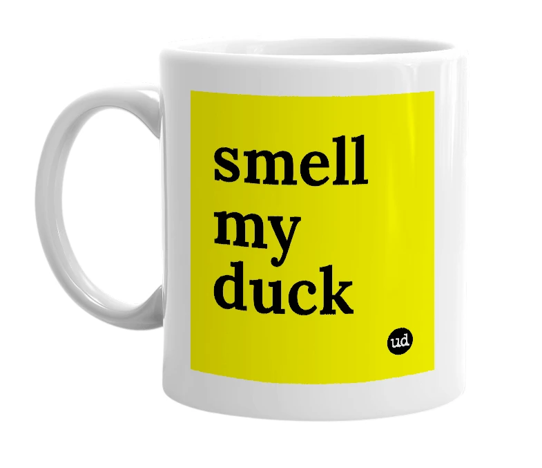 White mug with 'smell my duck' in bold black letters
