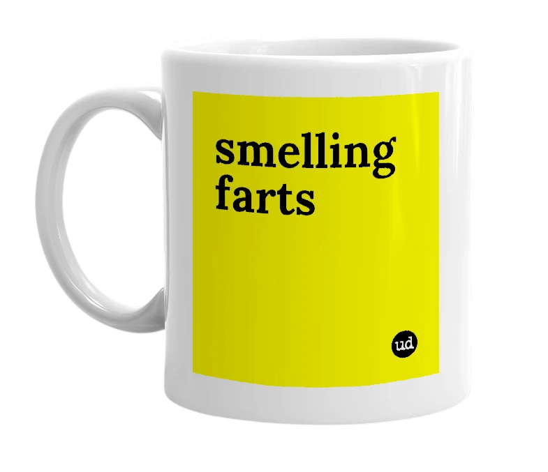 White mug with 'smelling farts' in bold black letters