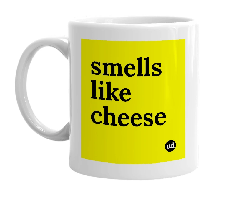 White mug with 'smells like cheese' in bold black letters