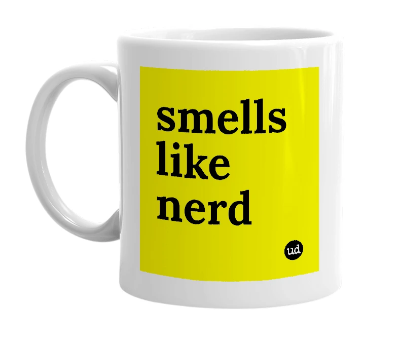 White mug with 'smells like nerd' in bold black letters
