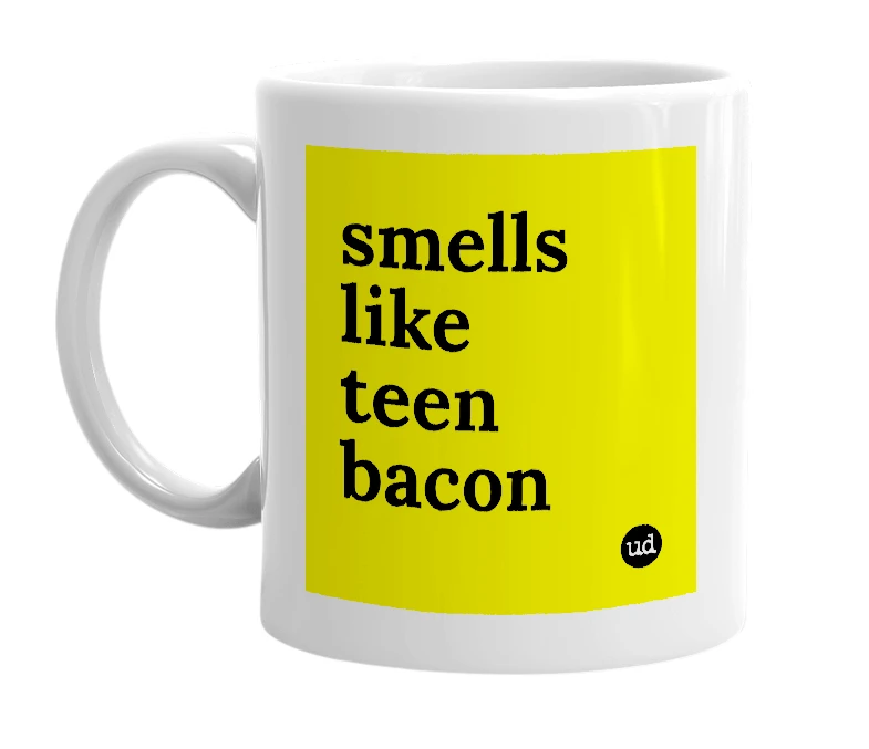 White mug with 'smells like teen bacon' in bold black letters