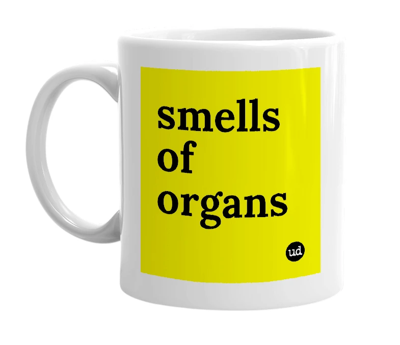 White mug with 'smells of organs' in bold black letters