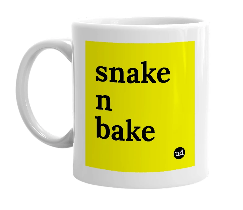 White mug with 'snake n bake' in bold black letters