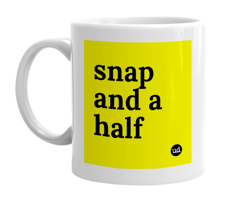 White mug with 'snap and a half' in bold black letters